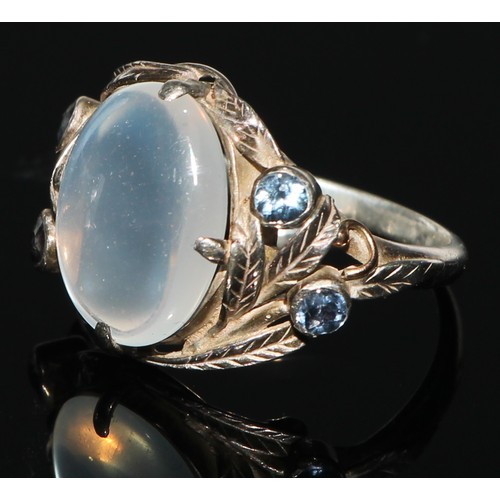 160 - A diamond and moonstone heart cluster ring, cental moonstone heart cabochon, surrounded by eighteen ... 