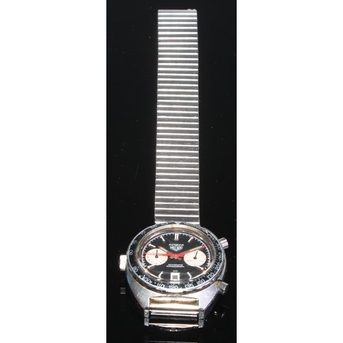 94 - Heuer - Autavia, ref 1163, a stainless steel chronograph bracelet watch, no. 246191, black dial with... 