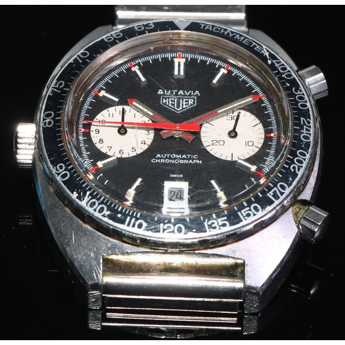 94 - Heuer - Autavia, ref 1163, a stainless steel chronograph bracelet watch, no. 246191, black dial with... 