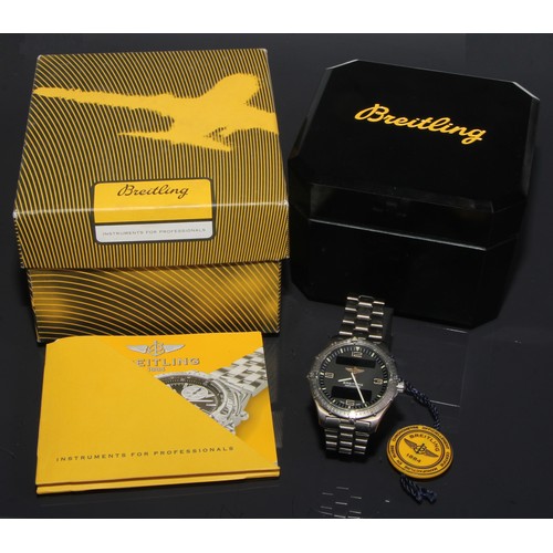 87 - Breitling - a quartz chronometer wristwatch, quartered Arabic numerals, minute track, centre seconds... 