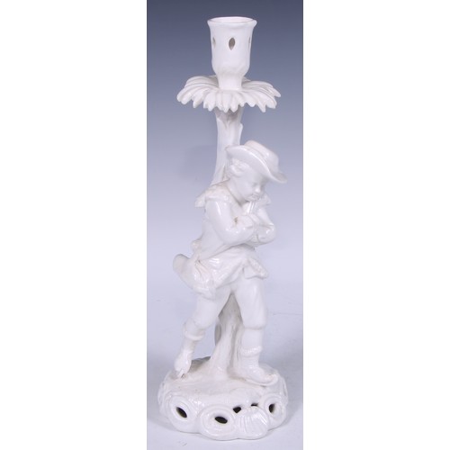 720 - A Samson Hancock Derby figural candlestick, Allegorical of Winter, in the white, 32cm high, S H crow... 