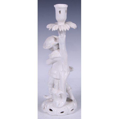 720 - A Samson Hancock Derby figural candlestick, Allegorical of Winter, in the white, 32cm high, S H crow... 