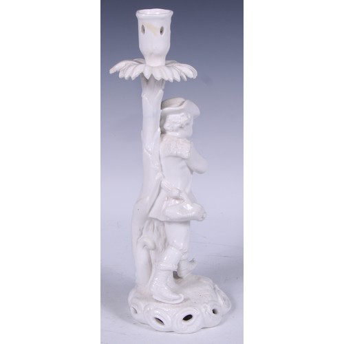 720 - A Samson Hancock Derby figural candlestick, Allegorical of Winter, in the white, 32cm high, S H crow... 