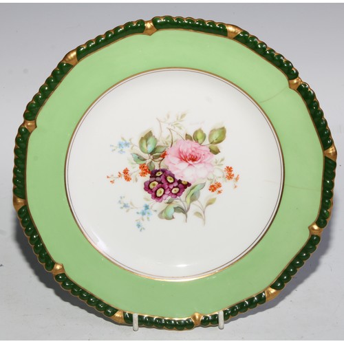 746 - A Royal Crown  Derby shaped circular plate, the field with three roses, within a shaped reserve, rub... 