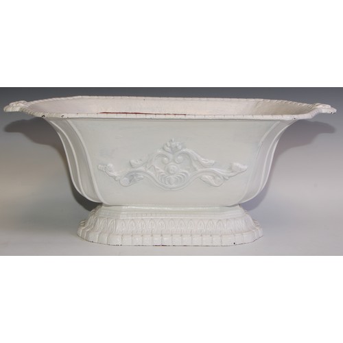 860 - A Victorian cast iron garrden trough, cast with scrolls, white painted, 67cm wide, 26cm high