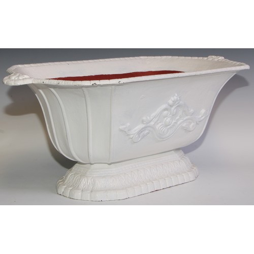 860 - A Victorian cast iron garrden trough, cast with scrolls, white painted, 67cm wide, 26cm high