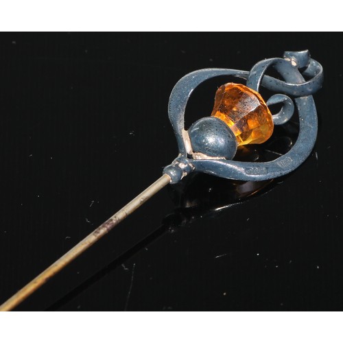 292 - A Charles Horner silver hat pin, set with an acorn with  amber paste stone, Charles Horner Chester 1... 