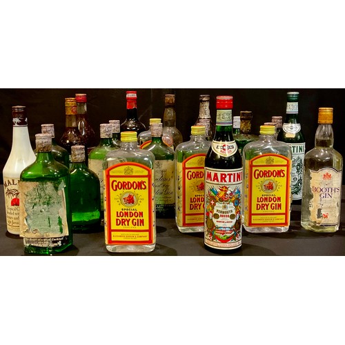 874 - Spirits, Liqueurs and Cocktails - nine bottles of Gordon's Gin, 70cl, 37.5%, the labels in various s... 