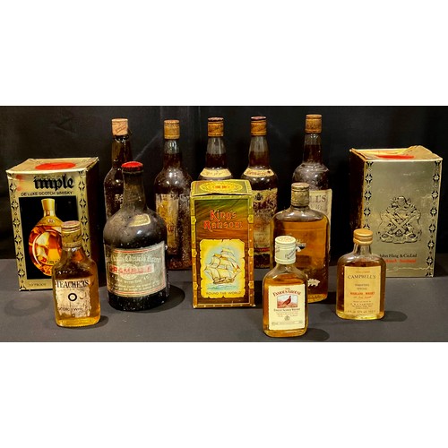 876 - Whisky - three bottles of Bell's Extra Special, 70cl, 40%, mixed labels, levels within neck, seals i... 