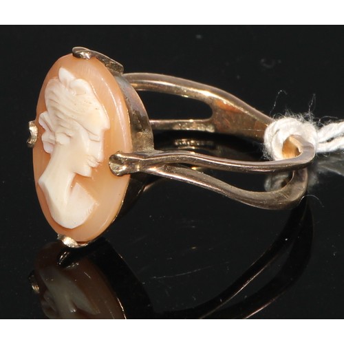 143 - A 9ct gold carved opal and quartz cameo ring, size O, marked 375, 5g; a 9ct gold carved shell cameo ... 