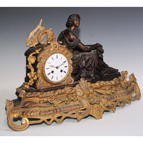 538 - A late 19th century French gilt and bronzed metal figural mantel clock, 9.5cm circular enamel dial, ... 