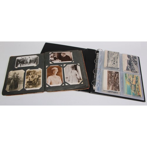 930 - Postcards - an Edwardian postcard album containing various black and white postcards relating to the... 