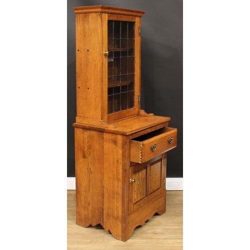 113 - Christopher Milner, Fine Woodcraft of Alfreton - an oak display or bookcase cabinet, moulded cornice... 