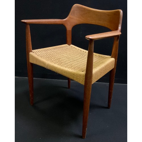 65 - Danish design - a set of four Mogens Koch teak dining chairs, comprising three chairs and a single c... 