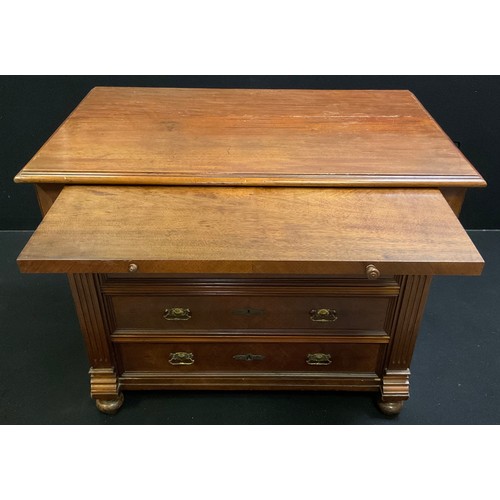 90 - A late 19th century French walnut chest of drawers with brushing slide to over-sailing top, above a ... 