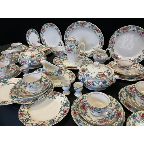 230 - Booths and Doulton Floradora pattern table service for eight, comprising plates, soup bowls, pair of... 