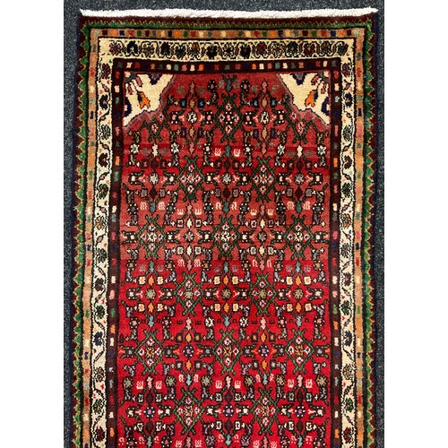 304 - A North-west Persian Hamadan rug / runner carpet, 266cm x 73cm.