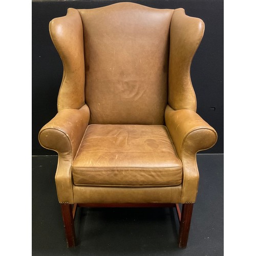 316 - A mid 20th century, Queen Anne style leather wing-back armchair, 116cm tall x 84cm wide.

(this chai... 