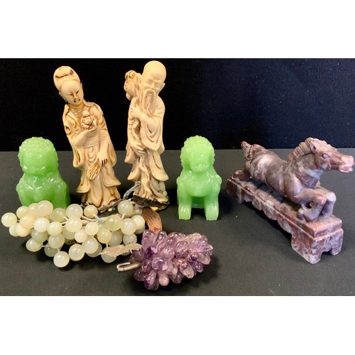 373 - A pair of green stone models, Chi Chi, 8.5cm high;  galloping Horse;  amethyst grapes;  resin figure... 