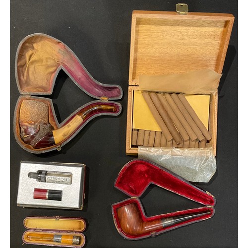 86 - A silver mounted cigar cutter, Birmingham 1972; a Meerschaum pipe as a Bavarian gentleman's head, ca... 