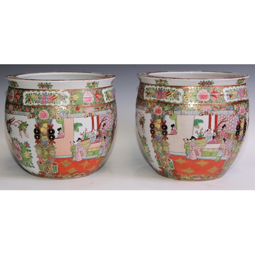 121 - A pair of Chinese famille rose fish bowls, hardwood stands, 48.5cm high on stand, 31.5cm diameter (2... 