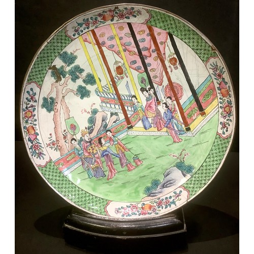 129 - A Chinese closionne dish, enamelled with figures, in a garden, 30cm diam, c.1880;  a Japanese cloiso... 