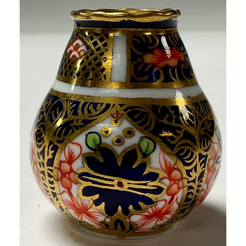 134 - A Royal Crown Derby Imari 1128 pattern hexagonal vase, 11.5cm, second; an 1128 miniature vase, 3.5cm... 