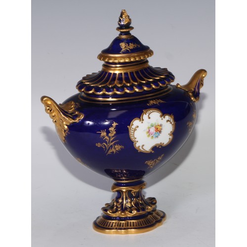 625A - A Royal Crown Derby two handled pedestal ovoid vase and cover, painted by Charles Harris, signed wit... 