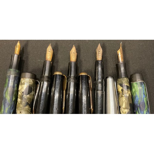 238 - Pens - a Mentmore marbled fountain pen, 14ct gold nib; others, 14ct gold nibs (5)