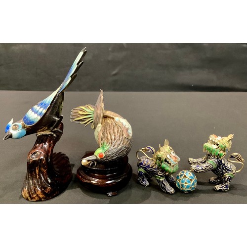 241 - A Chinese parcel filigree and cloisonne enamel bird, holding a pearl, wooden stand, 12cm long;  anot... 