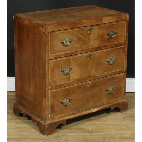 115 - A George II Revival featherbanded walnut caddy top chest, of three long drawers, 75.5cm high, 75cm w... 