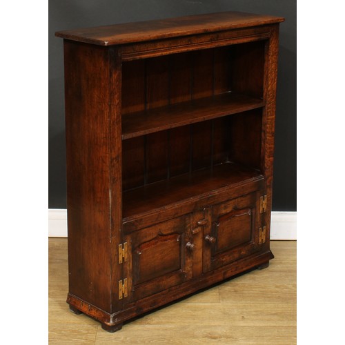 202 - An oak bookcase, probably Titchmarsh & Goodwin, 96cm high, 84cm wide, 26cm deep