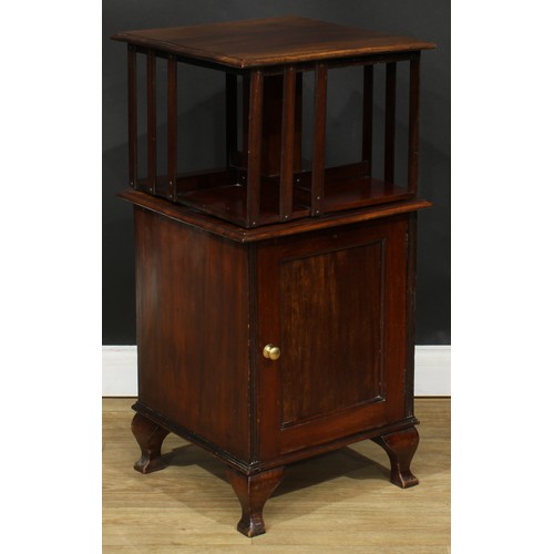 220A - An unusual early 20th century revolving bookcase cabinet, 91.5cm high, 46cm wide, 45cm deep, c.1925