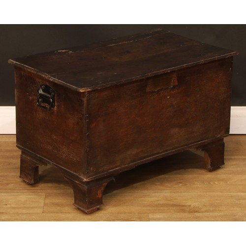 720 - An oak plank chest, hinged cover, 47cm high, 74cm wide, 44.5cm deep