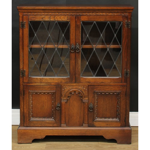 721 - An oak side cabinet, 102.5cm high, 84.5cm wide, 26cm deep; a similar coffee table, 45cm high, 102cm ... 