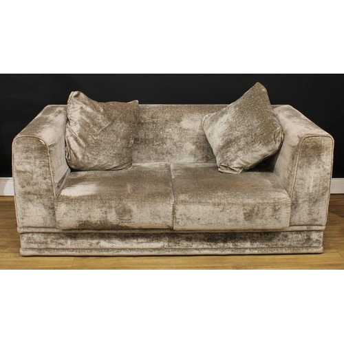 723 - A contemporary hotel reception sofa, 69.5cm high, 173cm wide, the seat 125cm wide and 65cm deep; ano... 