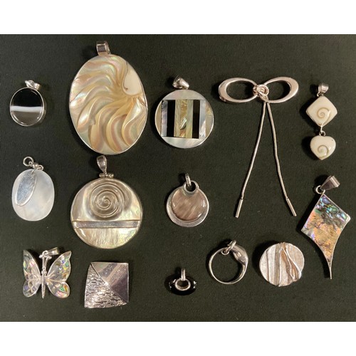 360 - A 925 silver mounted abalone pendant; others mother of pearl, Butterfly, banded agate etc (14)