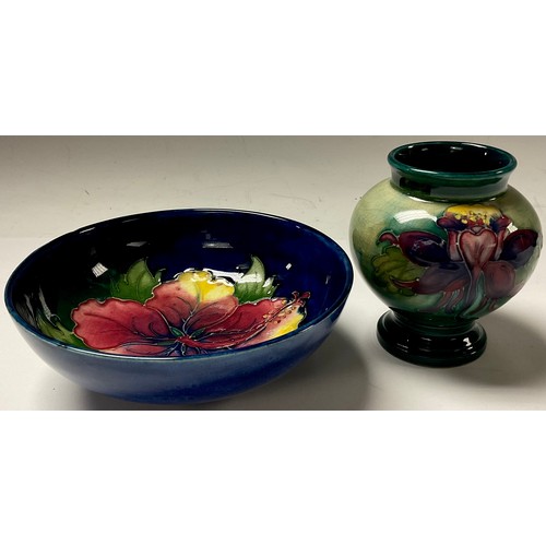 6 - A Moorcroft Orchid pattern miniature pedestal ovoid vase, 9cm, impressed marks; a Moorcroft Hibiscus... 