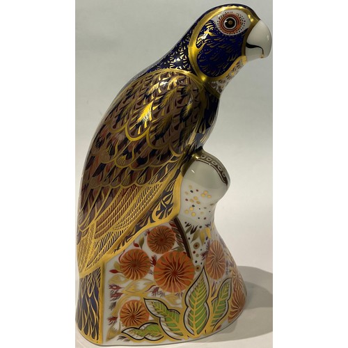 9 - A Royal Crown Derby paperweight, Bronze Winged Parrot, gold stopper, printed mark