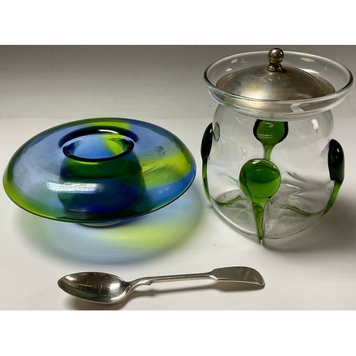 13 - An Art Nouveau glass preserve jar and cover; an iridescent green and blue Art Glass vase (2)