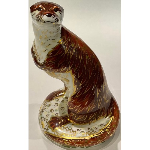 15 - A Royal Crown Derby paperweight, Playful Otter, gold stopper, printed mark, boxed