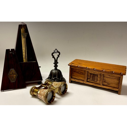 29 - A pair of mother-of-pearl opera glasses; a French rosewood metronome, Maelzel, 22cm; a Talent Produc... 