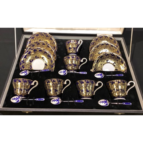 35 - A mid 20th century Aynsley gilded tea service for six with enamelled silver teaspoons en suite, case... 