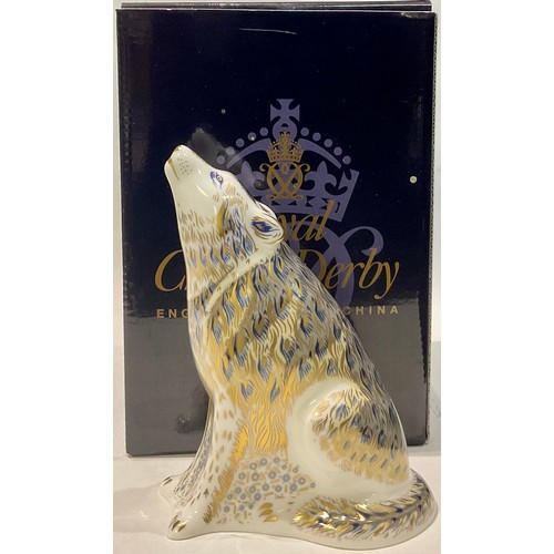 40 - A Royal Crown Derby paperweight, Howling Wolf, gold stopper, printed mark, boxed