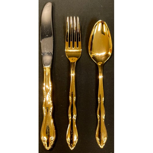 78 - A set of Rogers Brothers Golden Anniversary pattern gold plated flatware for six place settings, eac... 