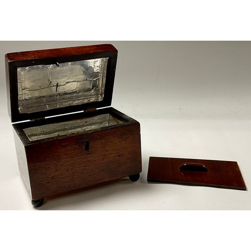 81 - A Georgian mahogany rectangular tea caddy; a mahogany elongated serving tray, inlaid with shell pate... 