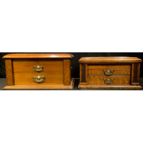 83 - A Walker and Hall oak canteen box, fitted with two drawers, 25 cm high, 45cm wide; another, smaller ... 