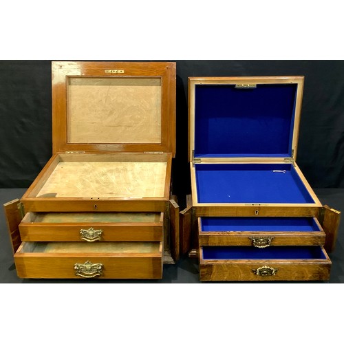 83 - A Walker and Hall oak canteen box, fitted with two drawers, 25 cm high, 45cm wide; another, smaller ... 