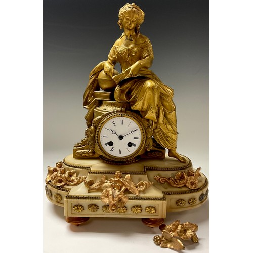 100 - A 19th century French gilt metal figural clock, classical female scholar, enamel dial with Roman num... 