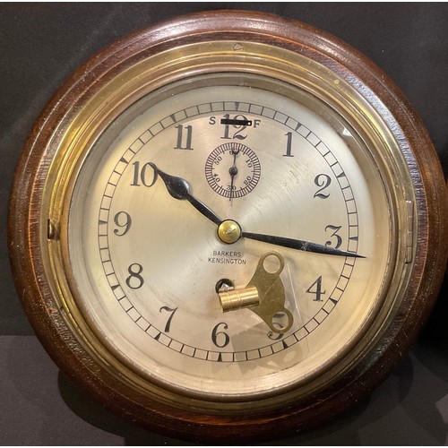 150 - An associated pair of early 20th century brass porthole clock and barometer, each with stepped oak m... 